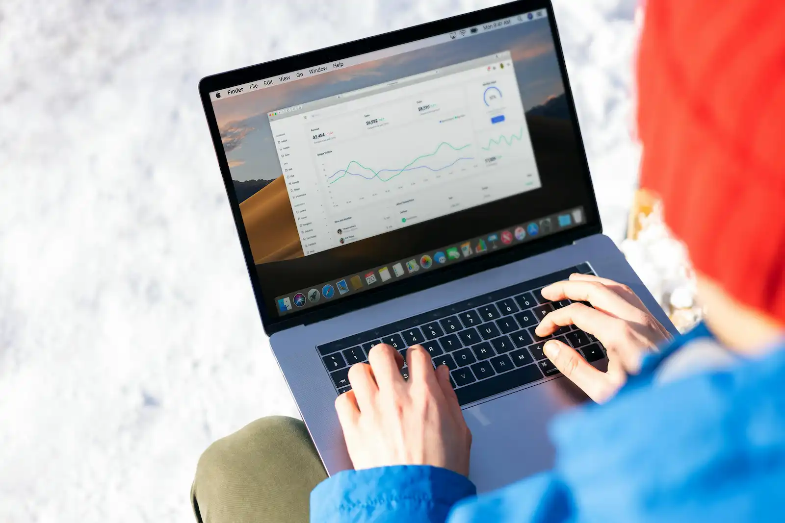 Laptop showing ecommerce analytics dashboard for Shopify SEO performance tracking
